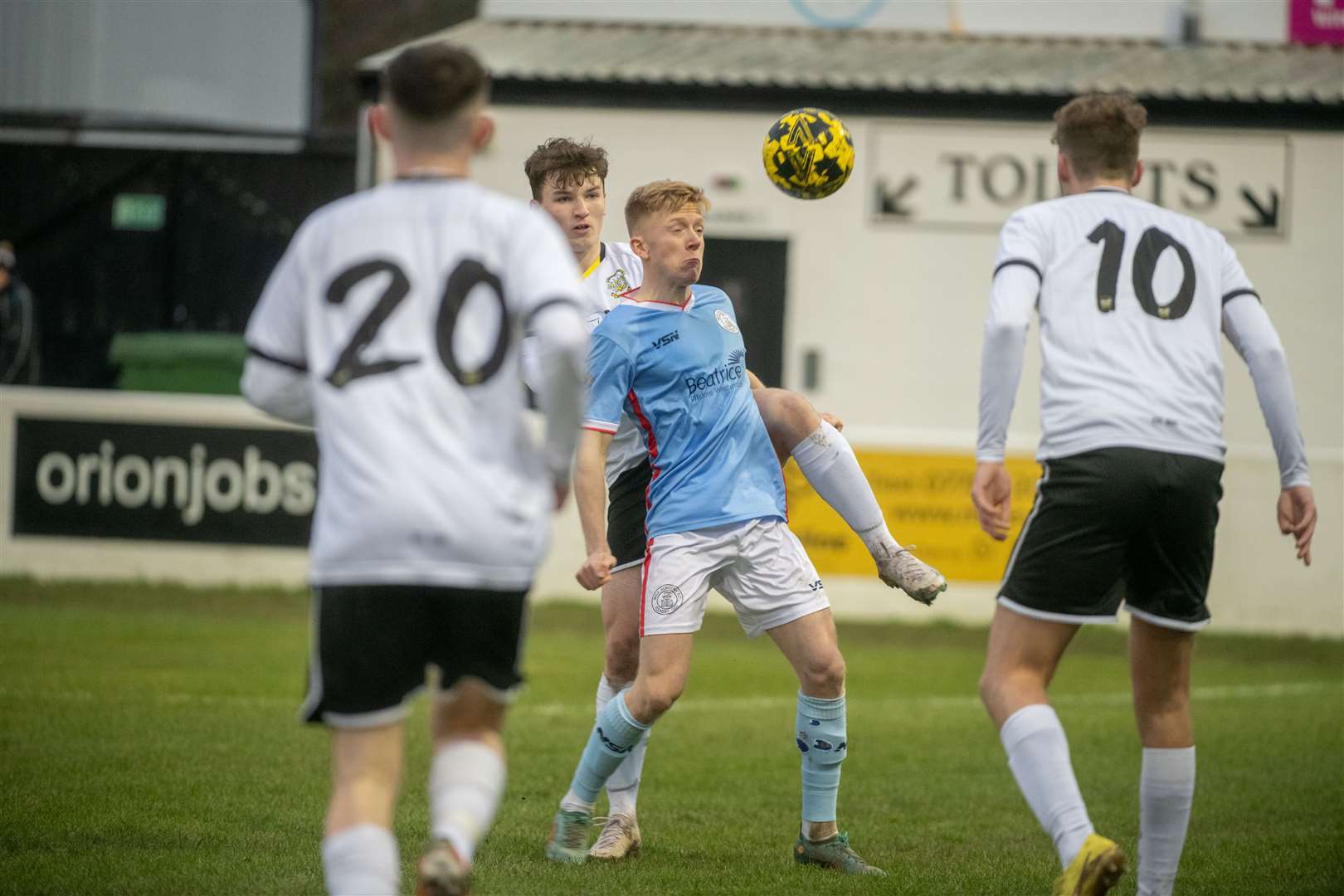 Wick Academy forward Ross Gunn is surrounded by Clachnacuddin players during Saturday's match in Inverness. Picture: Callum Mackay