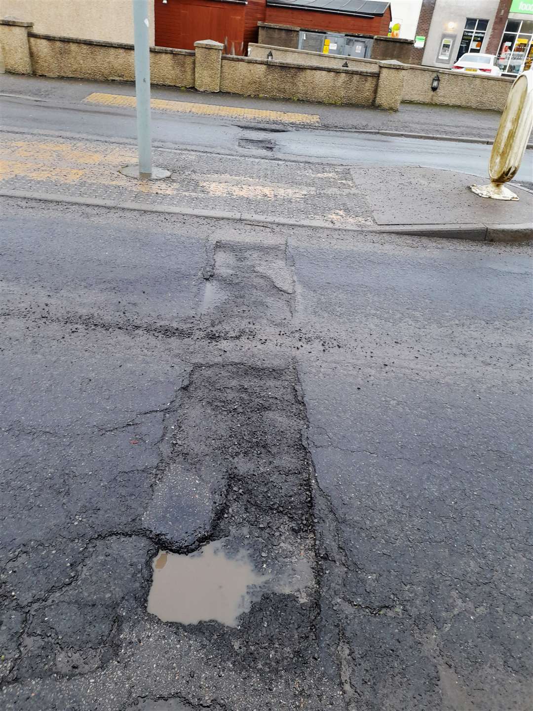 A potholed section of Thurso Road, Wick, which could represent a hazard for drivers. Picture: RBWCC