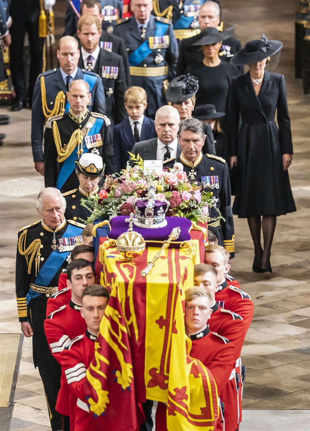 Members of the royal family follow behind the coffin of the Queen as it is carried out of Westminster Abbey after her state funeral (Danny Lawson/PA)