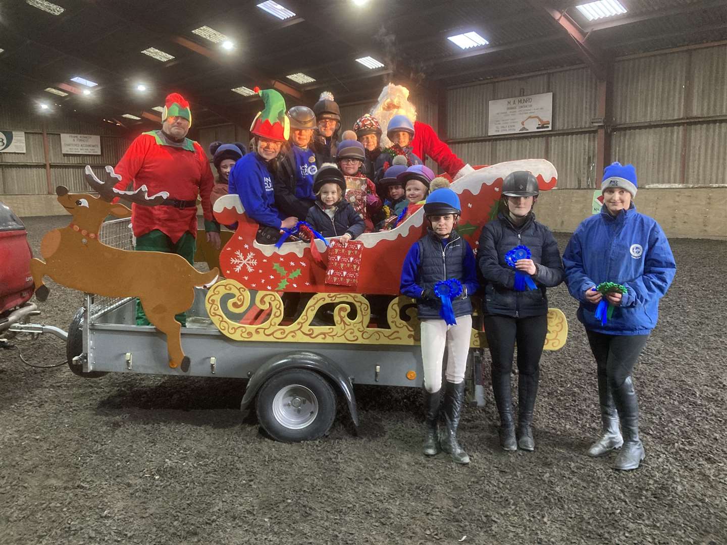 Caithness Pony Club members with Santa and his elf.