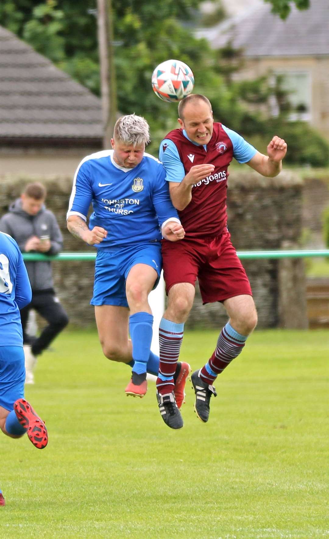 Acks' Kuba Koziol in an aerial duel with Shaun Forbes of Pentland United during Saturday's Colin Macleod Memorial Cup final in Castletown. Picture: James Gunn