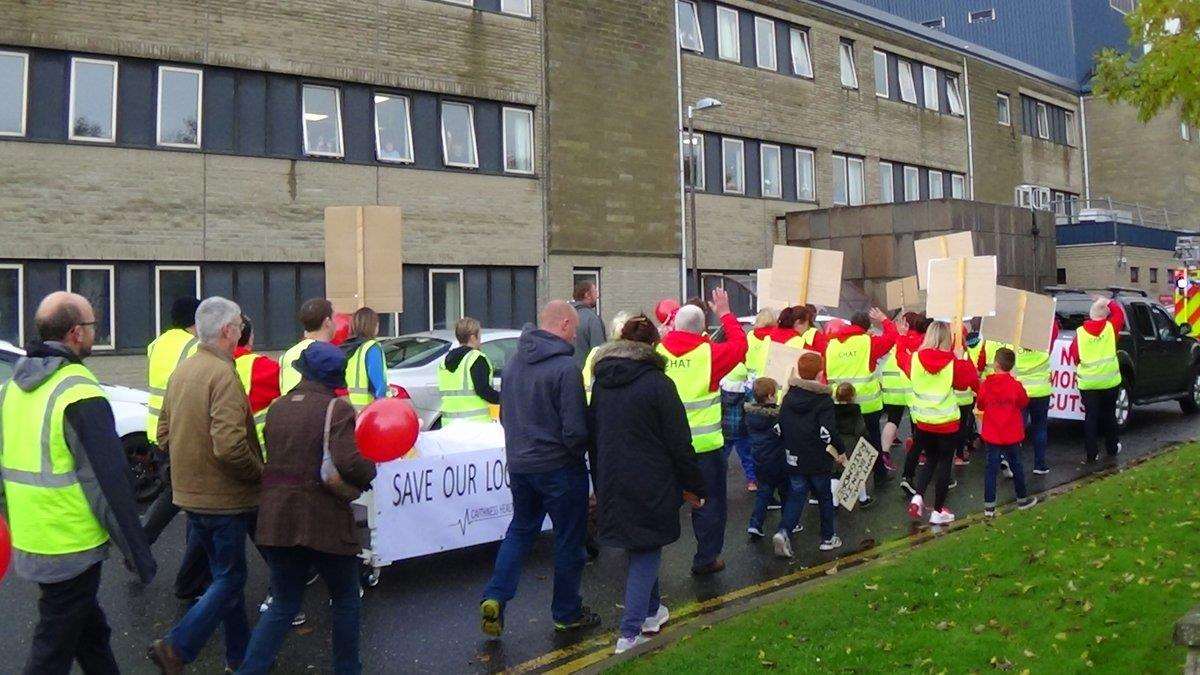 Protestors march past Caithness General Hospital in Wick. Photo: Will Clark
