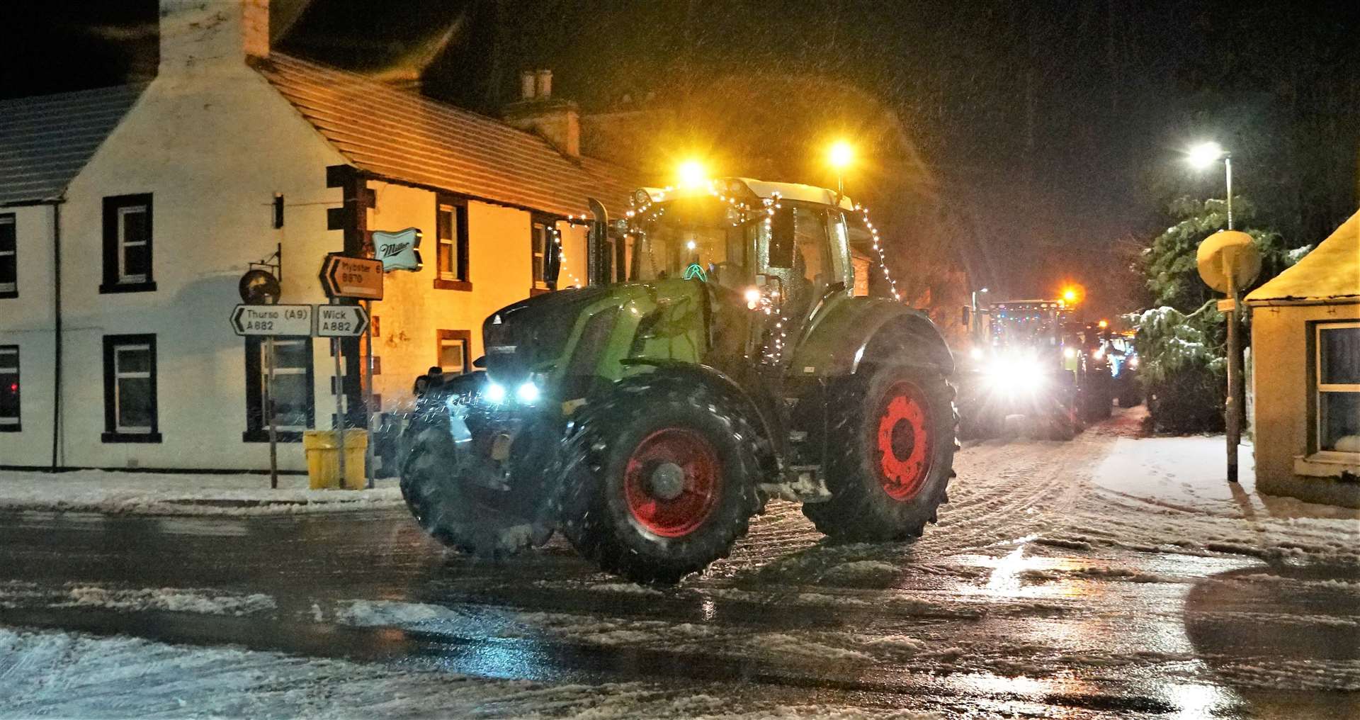 Young Farmers centenary tractor run travels through Watten on its way to Thurso from Bower. Picture: DGS