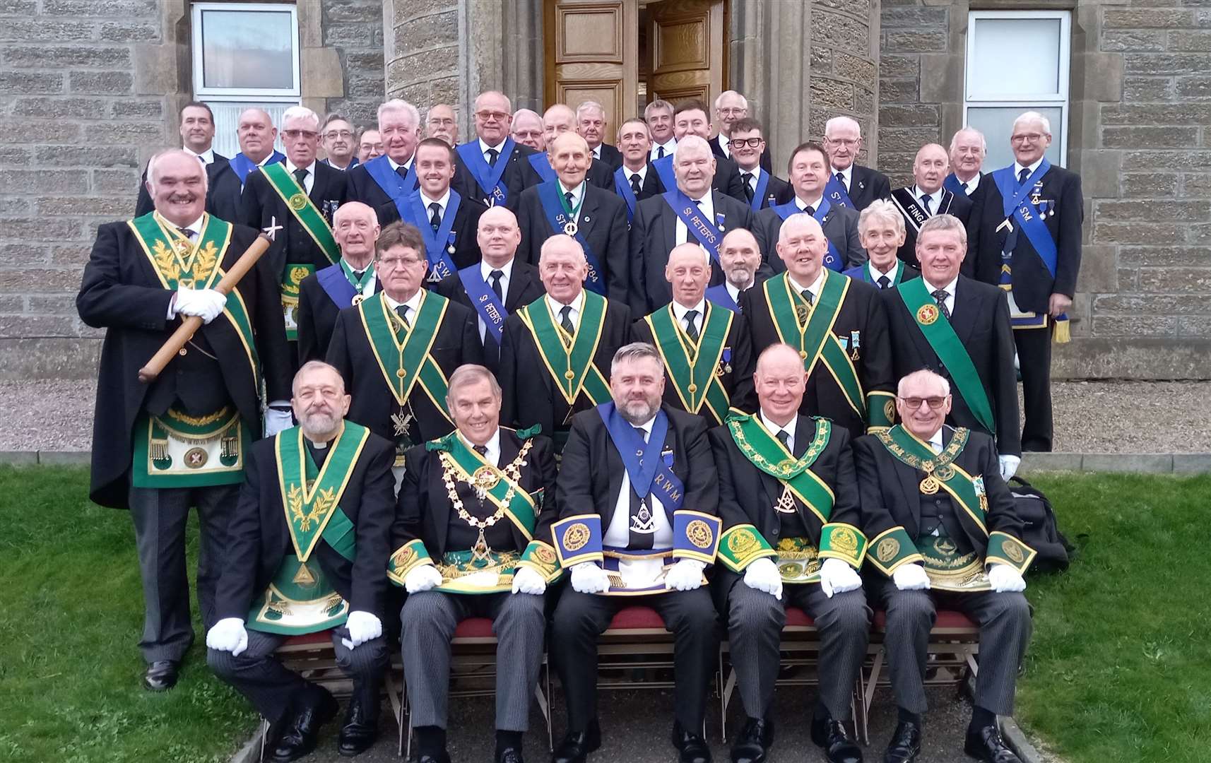 From left (front): Rev Adrian Bunnell, Ramsay McGhee, Grand Master Mason of Scotland, William Durrand, Right Worshipful Master of St Peter’s Operative No 284, Jim Beattie, Provincial Grand Master of Caithness, and William MacLeod, immediate past Provincial Grand Master of Caithness, with lodge members looking on. Picture: Willie Mackay
