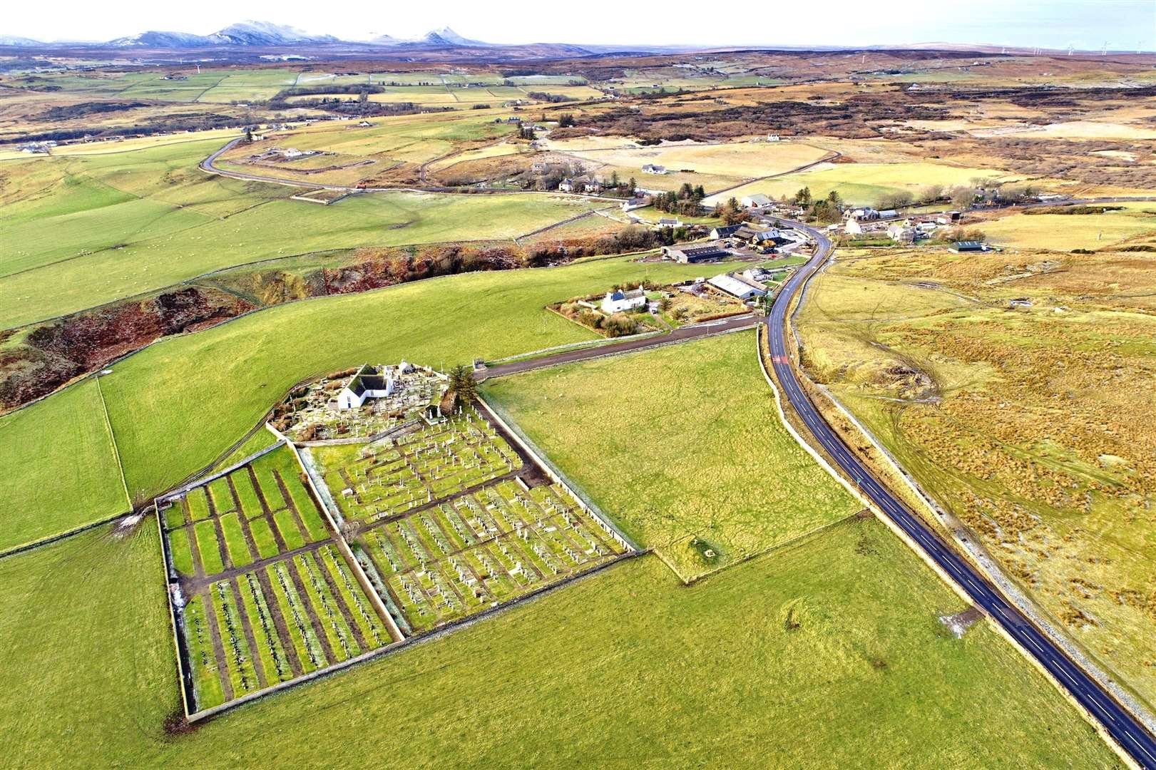 The cemetery at Latheron and the landscape beyond looking south.