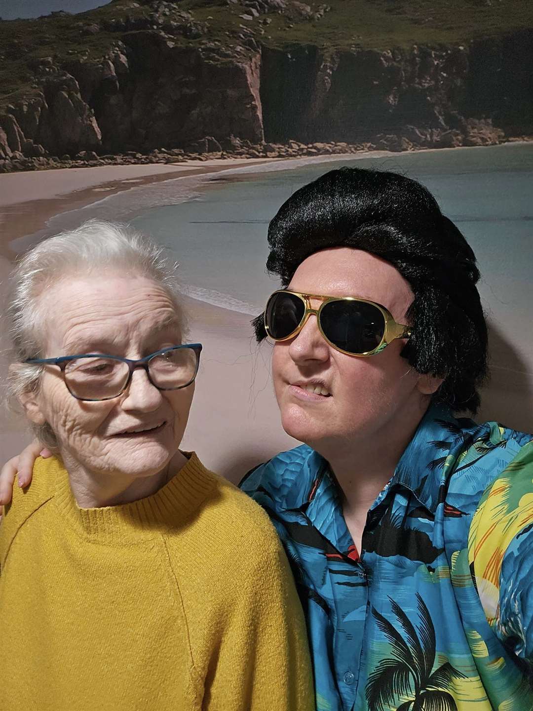 Elvis poses for a snapshot with care home resident Catherine Foubister.
