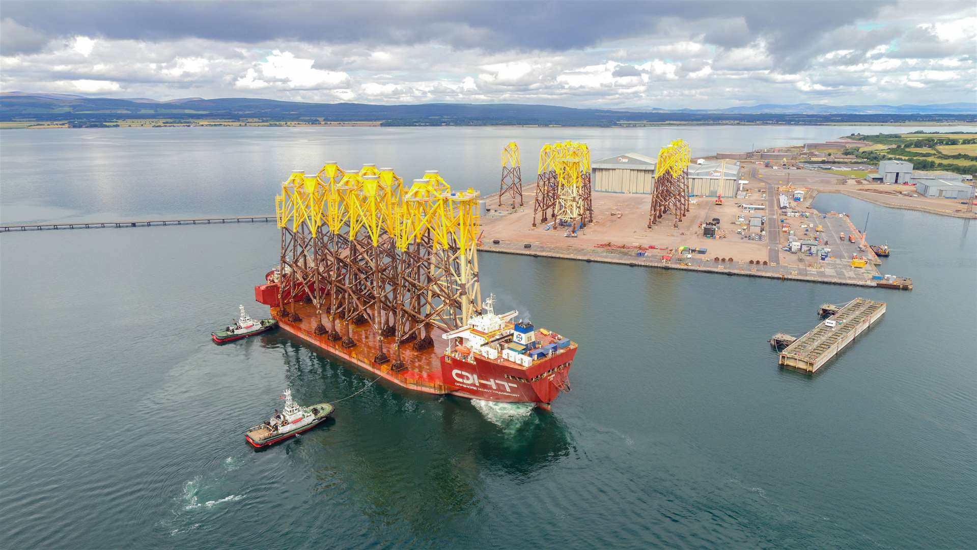 The heavy transport vessel OHT Hawk carrying wind turbine jackets for the Moray East offshore wind farm to Nigg Energy Park. Picture: Malcolm McCurrach