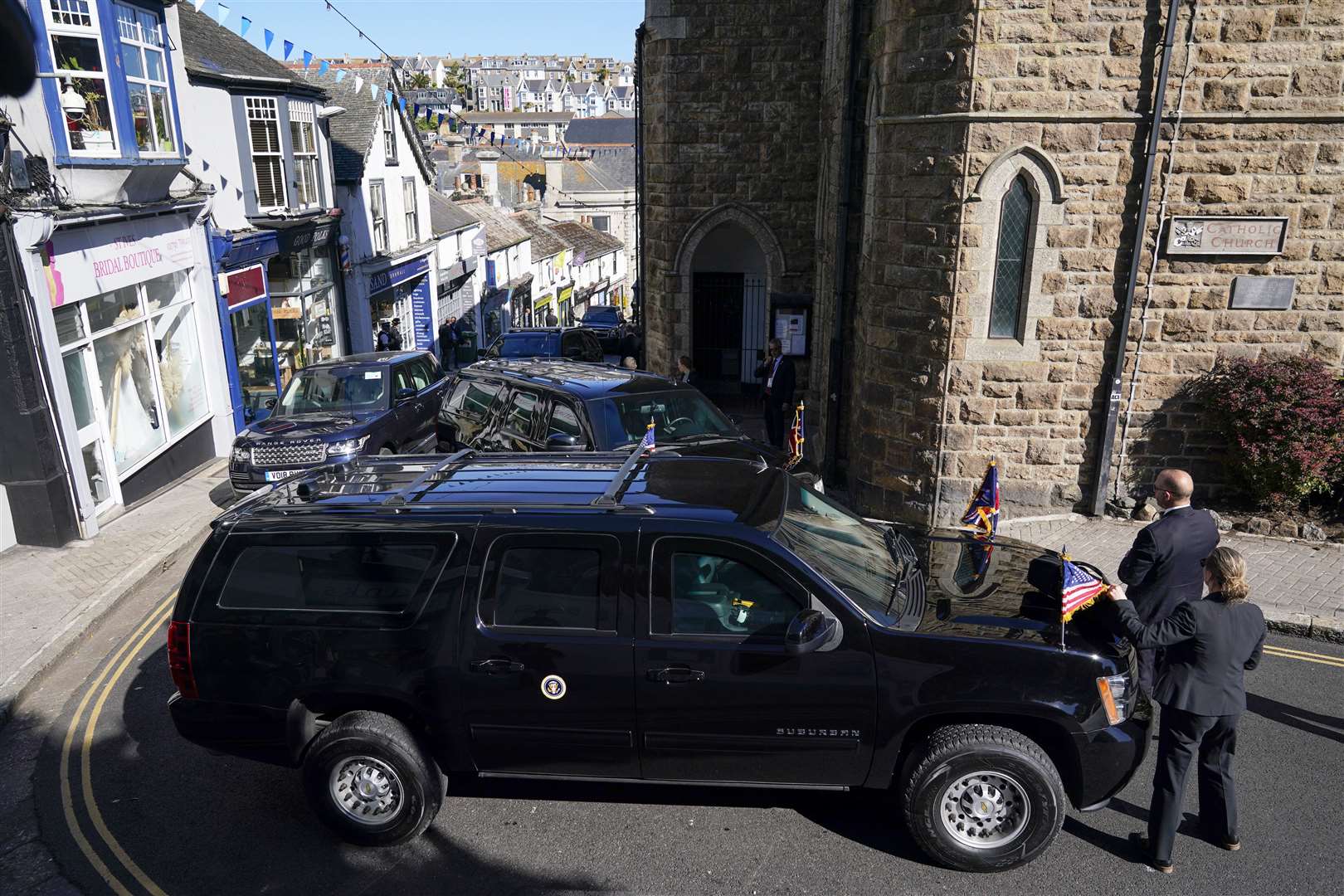 Several security people lined the streets of St Ives while US President Joe Biden and his wife attended Mass (Patrick Semansky/AP)