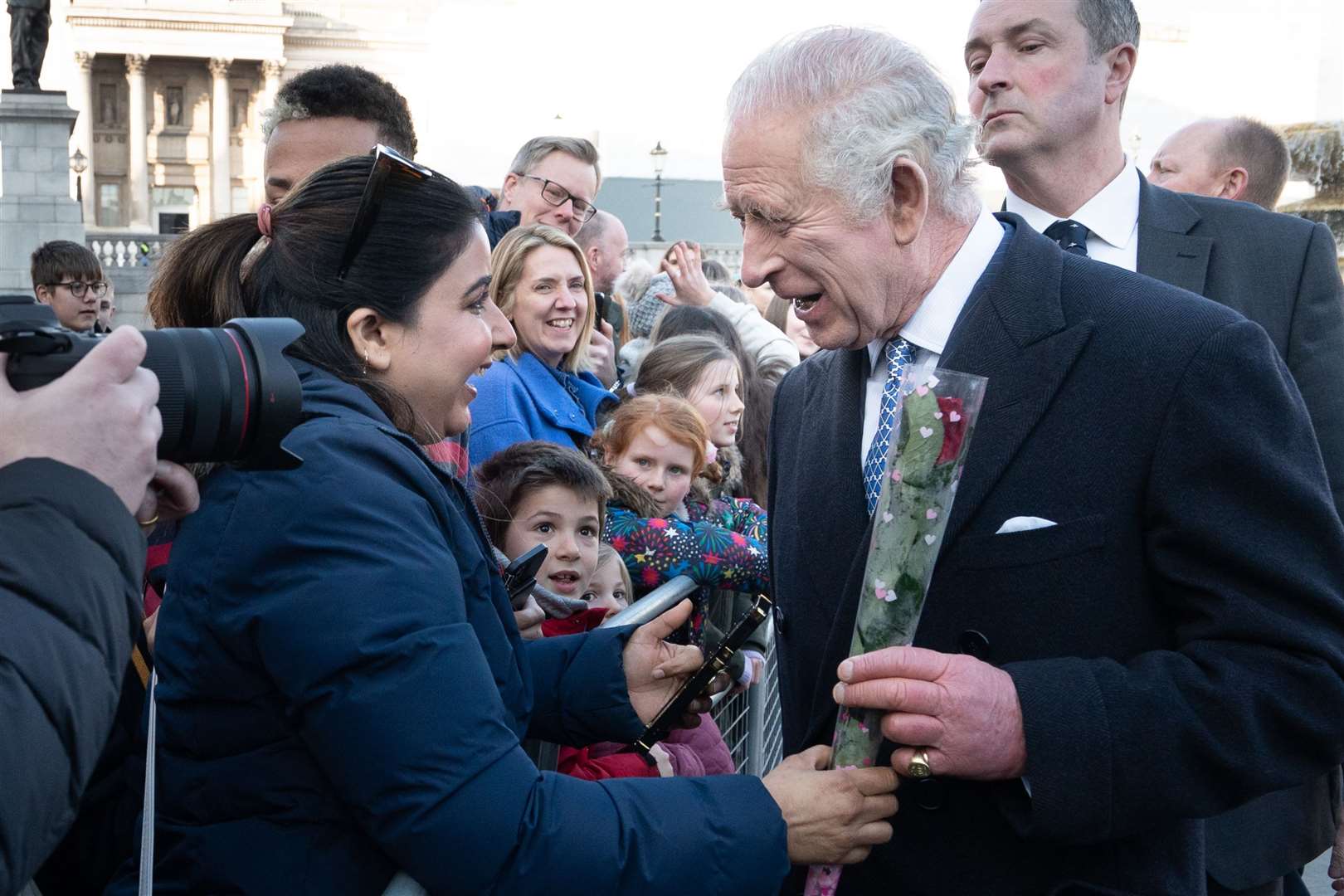 Charles is given a rose for St Valentine’s Day by a well-wisher (Stefan Rousseau/PA)