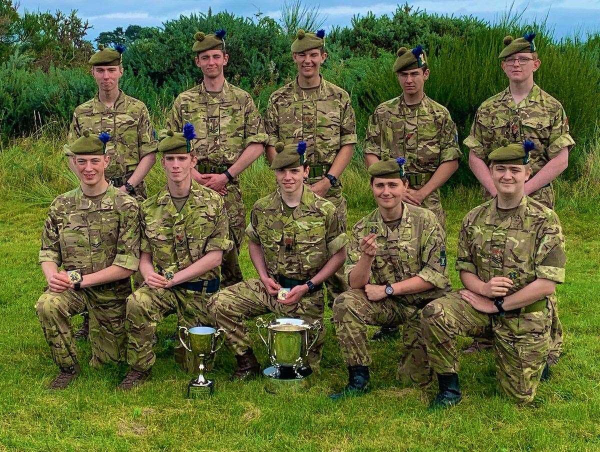 RSM Jack (front, centre) and Sgt Sutherland-West (top right) and the 1 Highlanders team with their silverware at Barry Buddon.