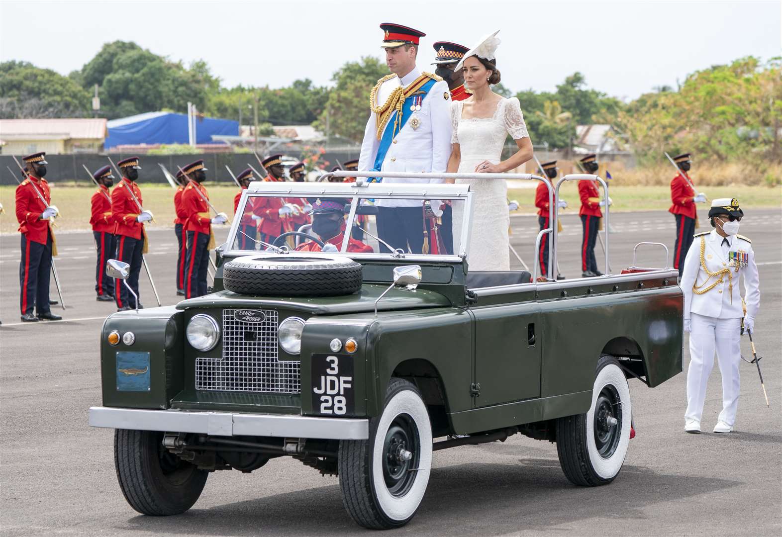 William and Kate attend the inaugural commissioning parade for service personnel from across the Caribbean during their visit to Kingston, Jamaica (Jane Barlow/PA)