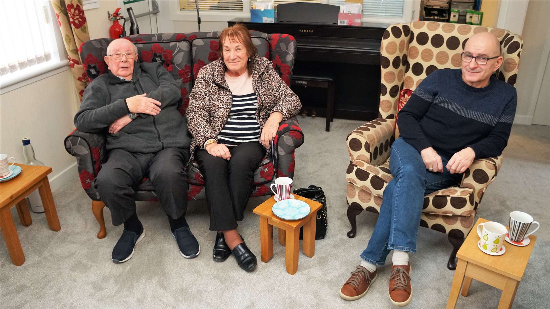 From left, members John Black and Frances Purves with volunteer Stan George. They said the centre has been a great support for them. Picture: DGS