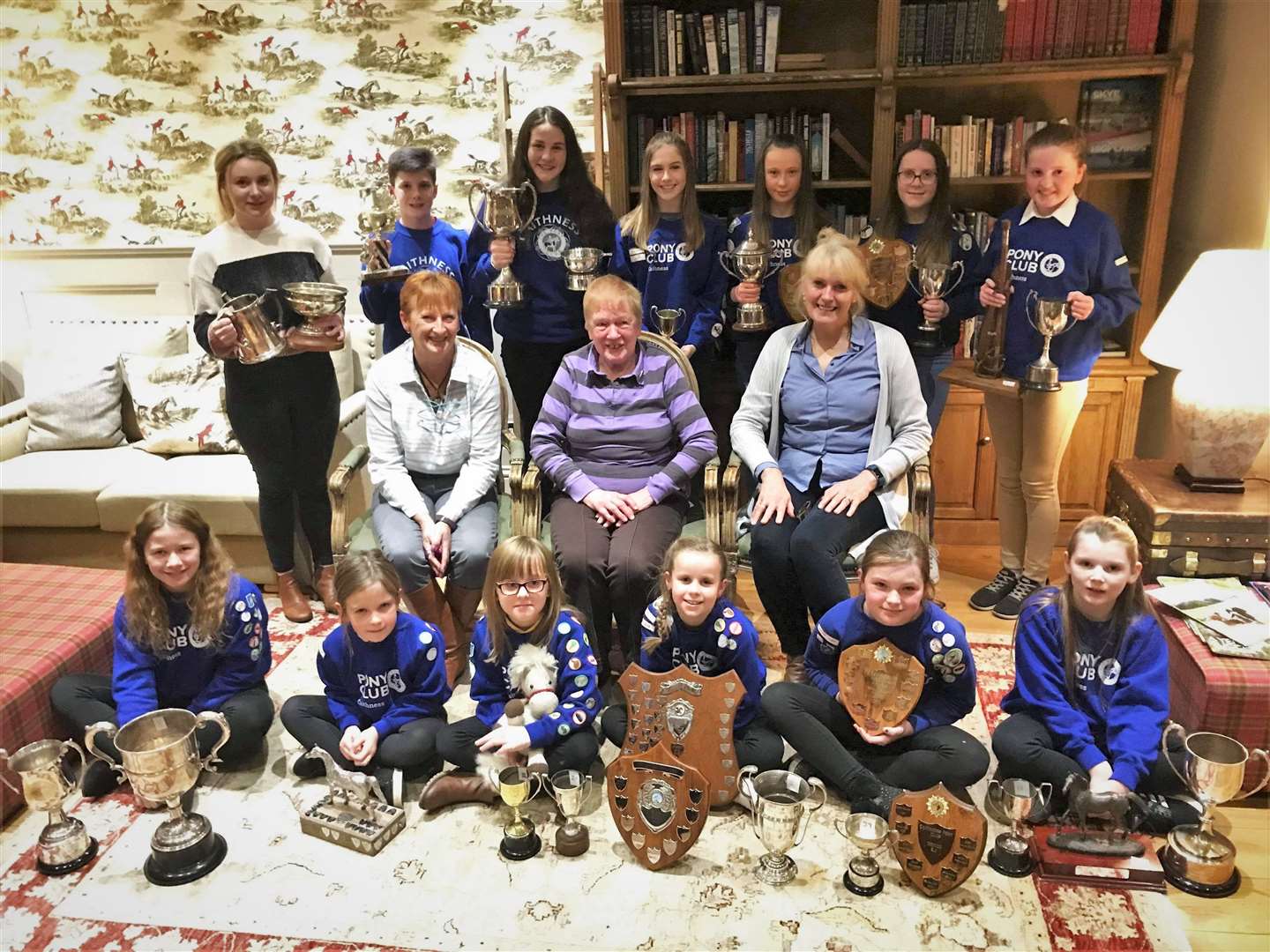 Members of Caithness branch of the Pony Club following the annual presentation of prizes. Back row (from left): Emma Coghill, Liam Mackenzie, Morven Mackenzie, Erin Hewitson, Alysha Homes and Ellen Traquair. Middle row: Jane Campbell, honorary president Jessie Allan and retiring DC Linda Ramsøy. Front: Leoni Kennedy, Erica Pottinger, Ella Budge, Aimee Homes, Gina Cowe and Isla Miller.