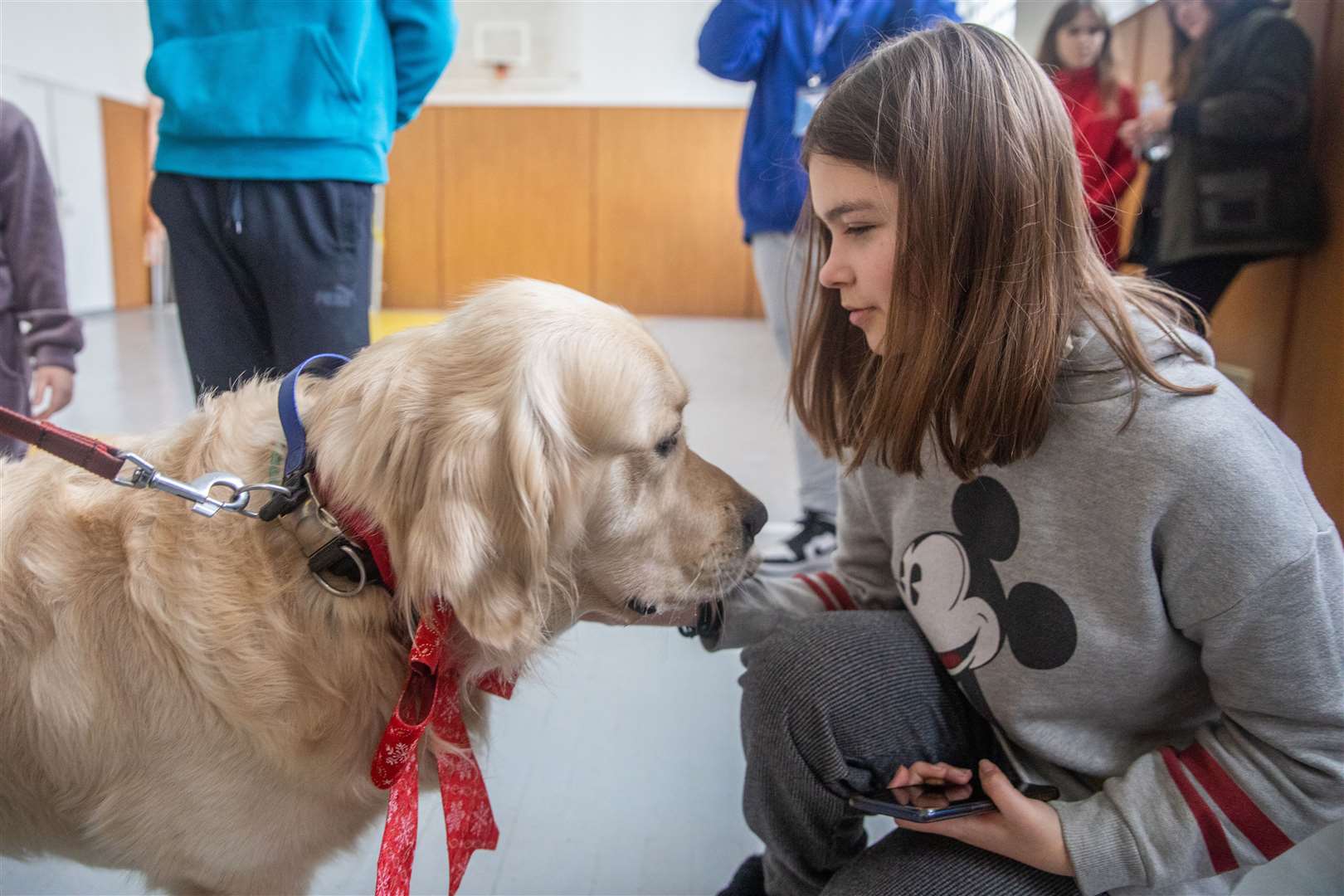 Dog Parker pictured with Karina, 13 (Oleksandr Khomenko/Save the Children)