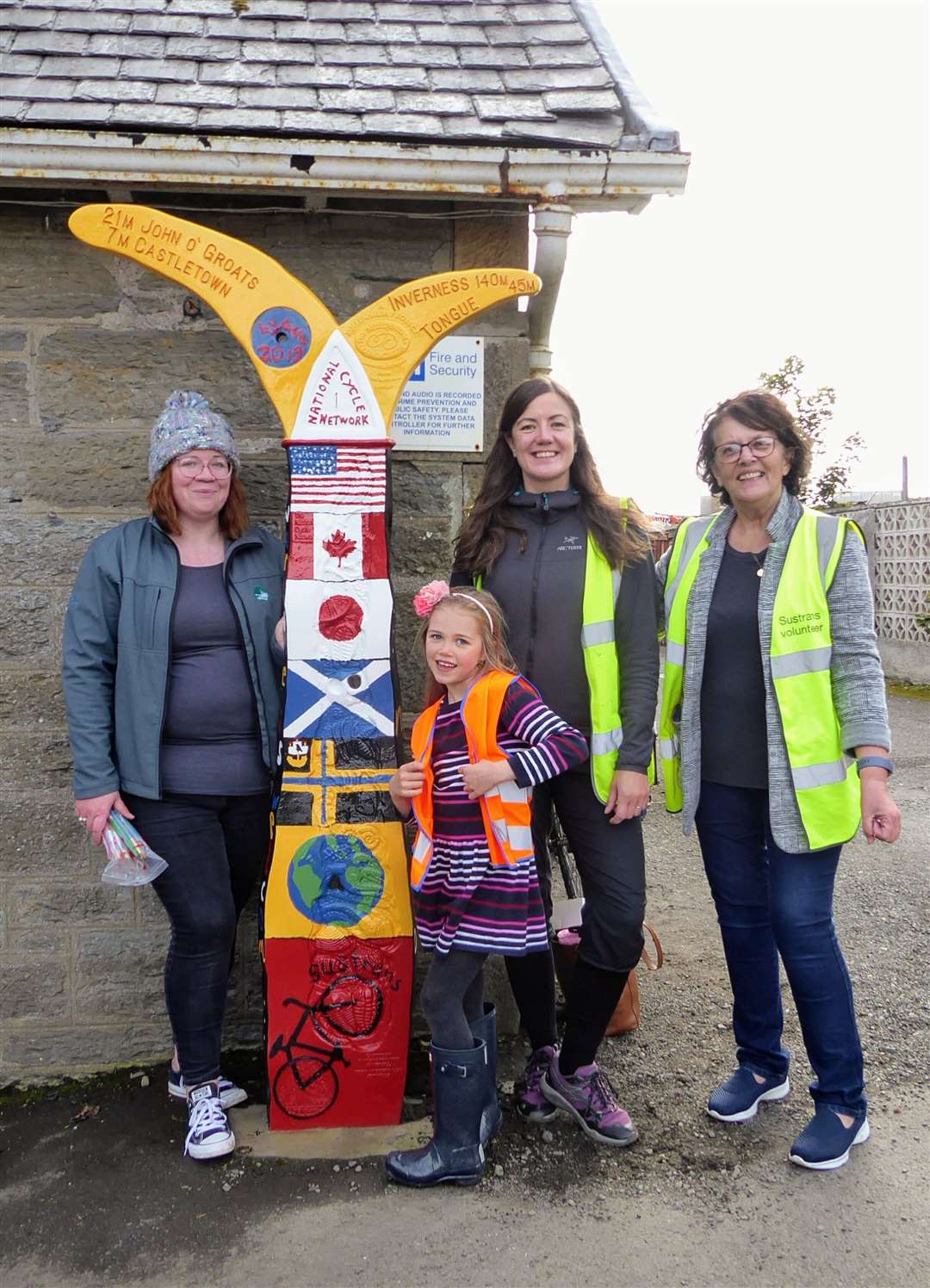 With the newly painted route marker are (from left) Thurso development officer Joan Lawrie, Ava Kelly, Laura White from Sustrans, and Ava's granny Lora Dillon.