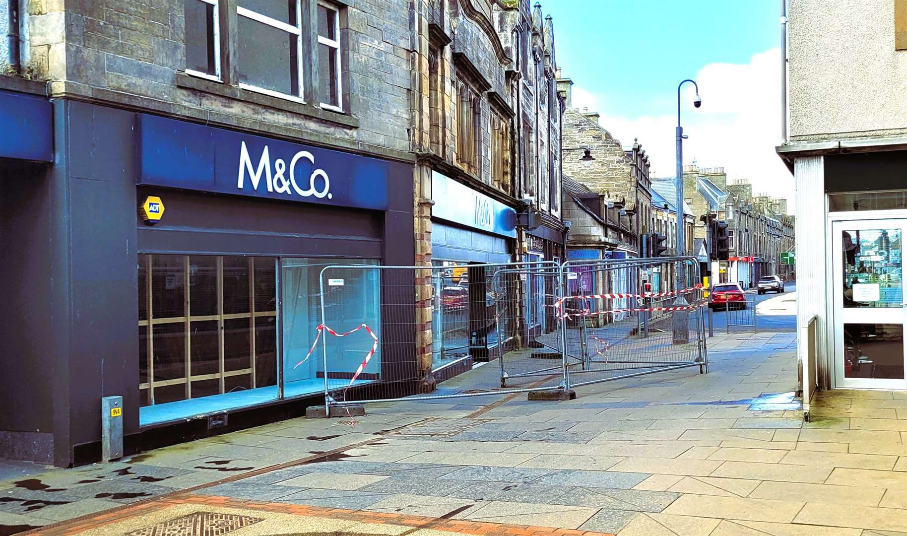 A fire broke out at the former M&Co shop in Thurso. The fencing outside it was previously criticised for causing a major obstruction and was then removed. Picture: Alexander Glasgow