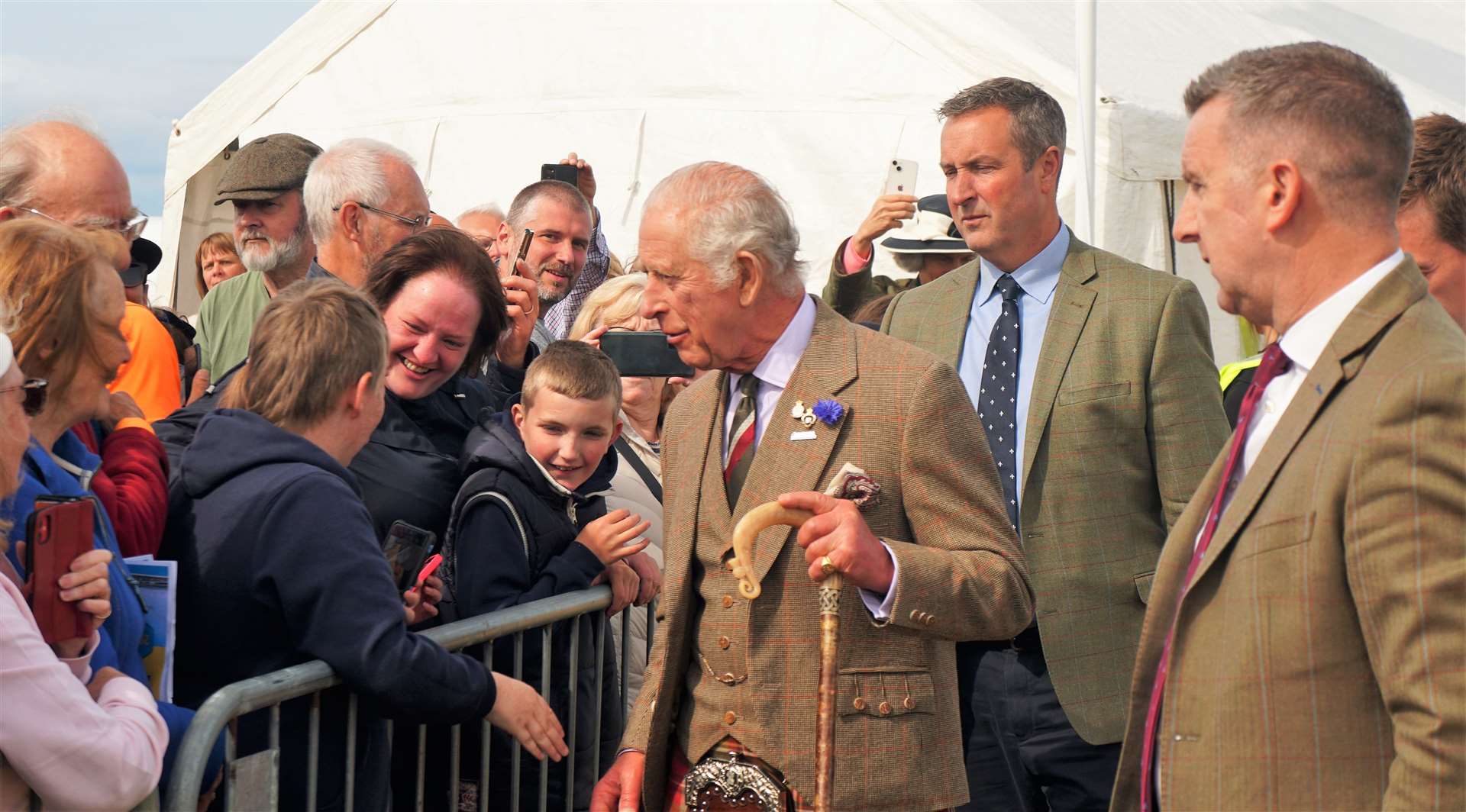 The King meets members of the public during a brief walkabout. Anna Polson from Lybster said her children were delighted to shake his hand. Picture: DGS