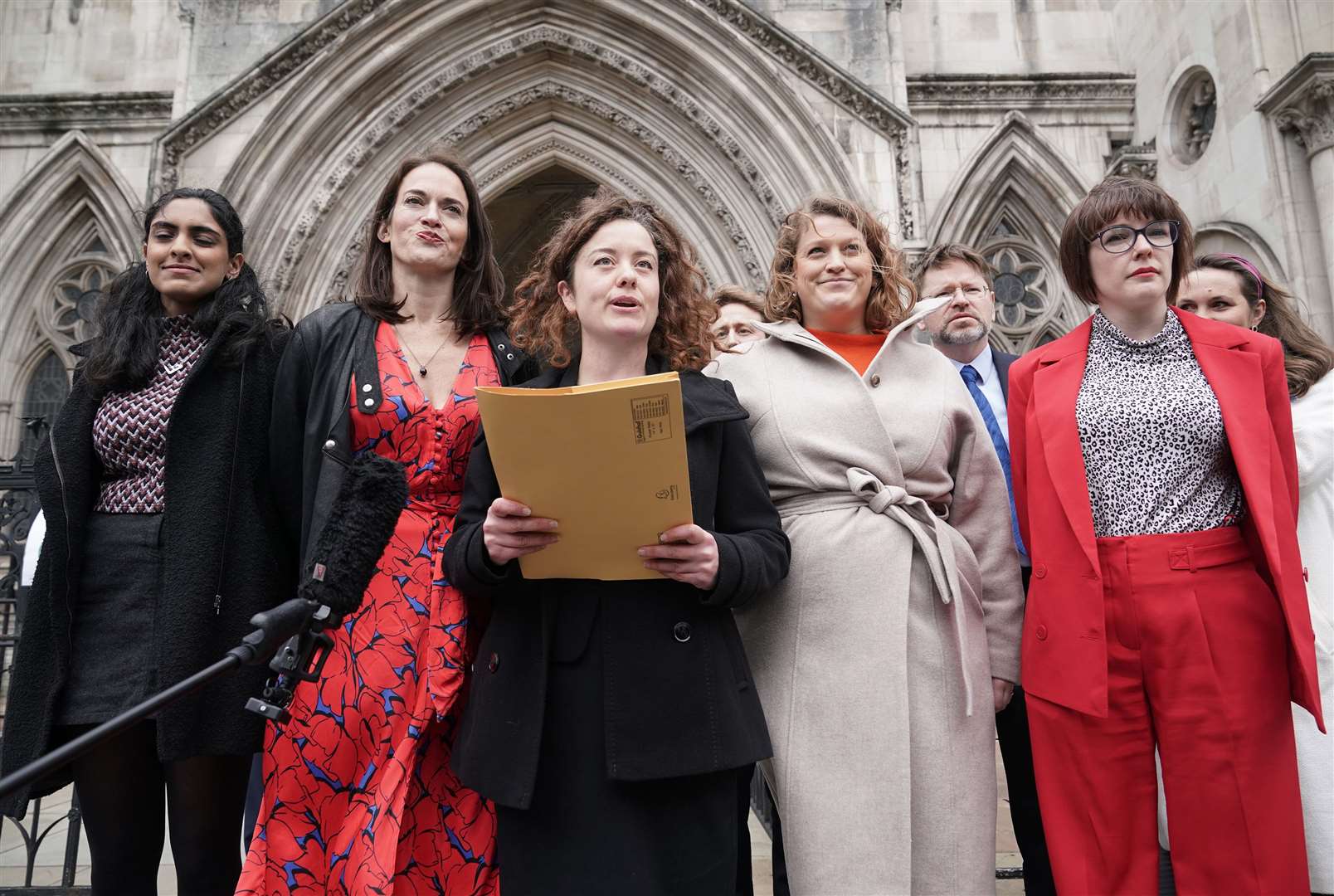 Solicitor Theodora Middleton (centre) after an earlier High Court hearing (Yui Mok/PA)
