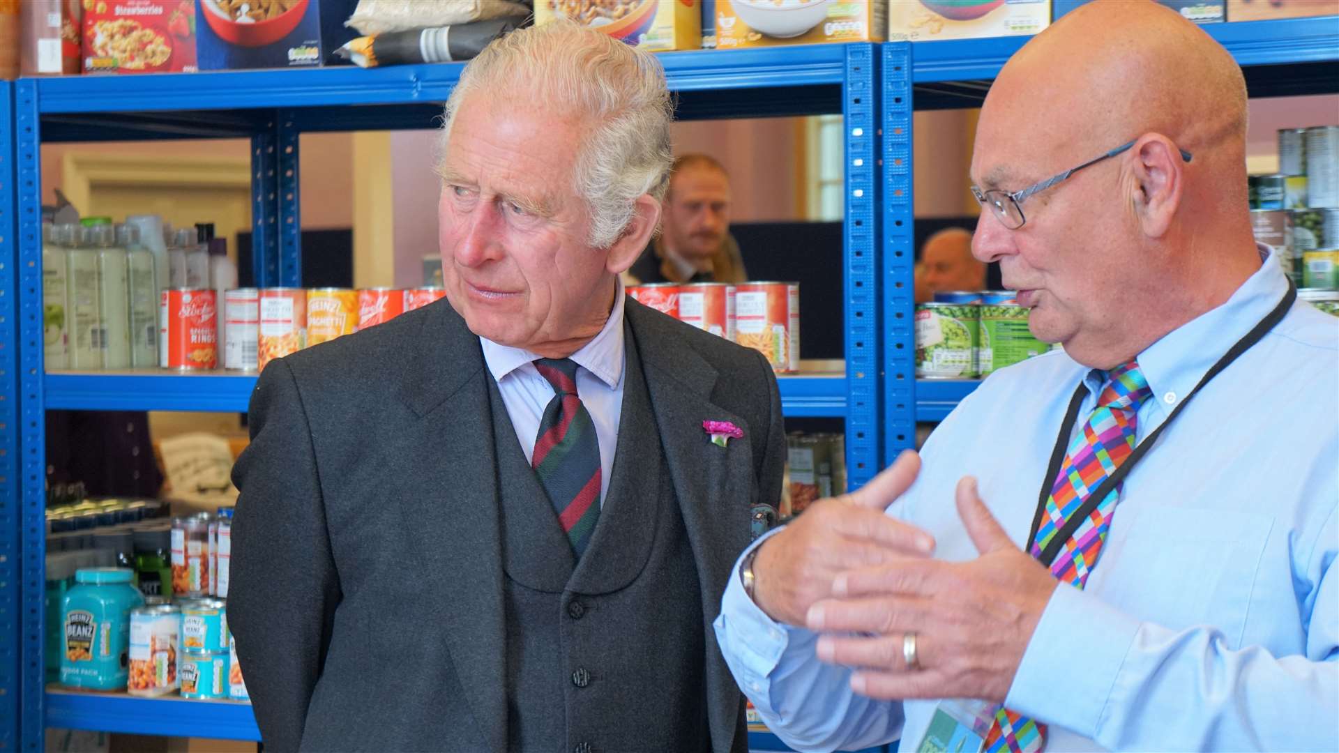 Charles in conversation with Grant Ramsay at the food bank's Wick base. Picture: DGS
