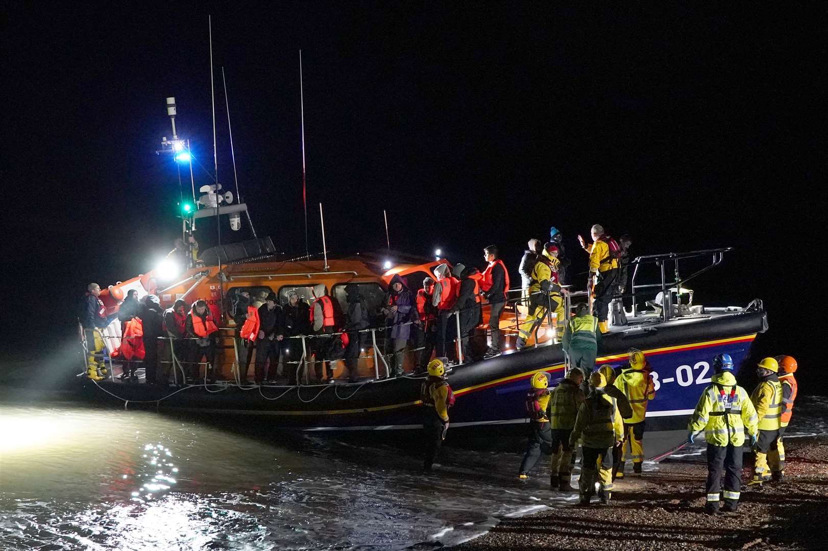 A group of people being helped by RNLI lifeboat following a small boat incident in the Channel. (Gareth Fuller/PA)