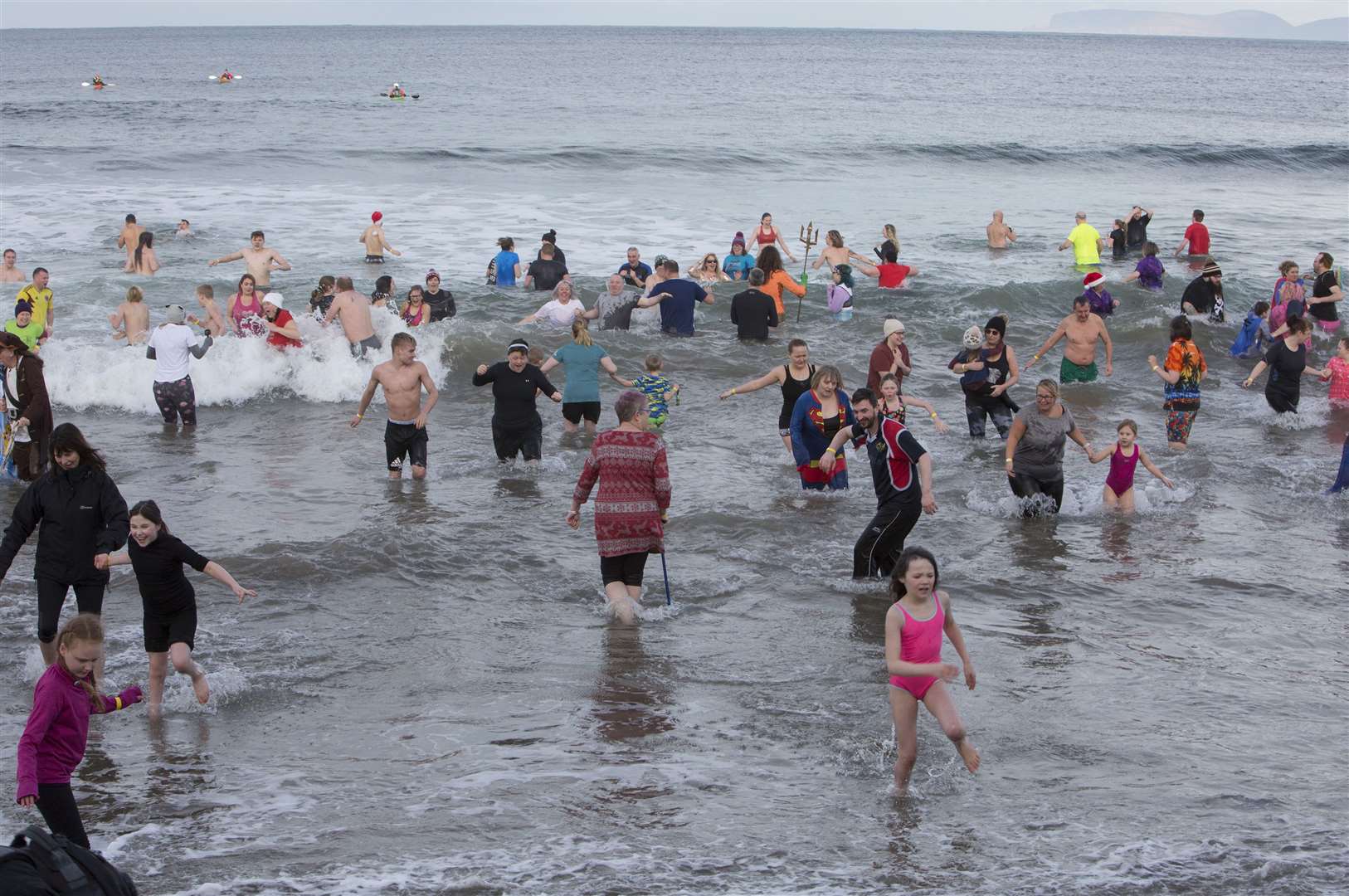 Some of the 120 bathers who took the sea in Thurso Community Development Trust's first New Year Soakin'. Picture: Robert MacDonald / Northern Studios