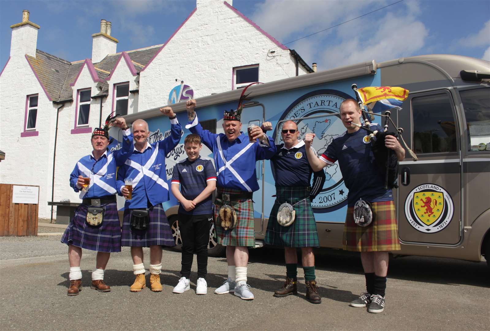 Members of Top Joe's Tartan Army were in full voice as they set off from the Northern Sands Hotel in Dunnet to support Scotland at the European Championship football finals. Picture: Alan Hendry