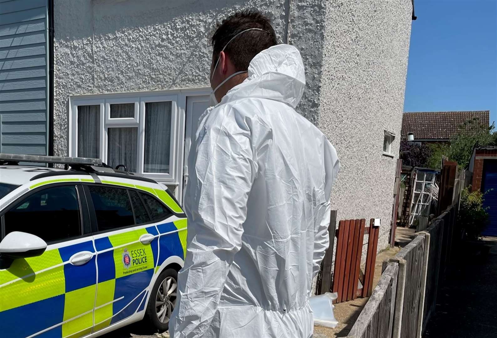Officers at a home in Victory Road in Mersea Island, near Colchester, where Stephen and Carol Baxter were found dead (Essex Police/PA)