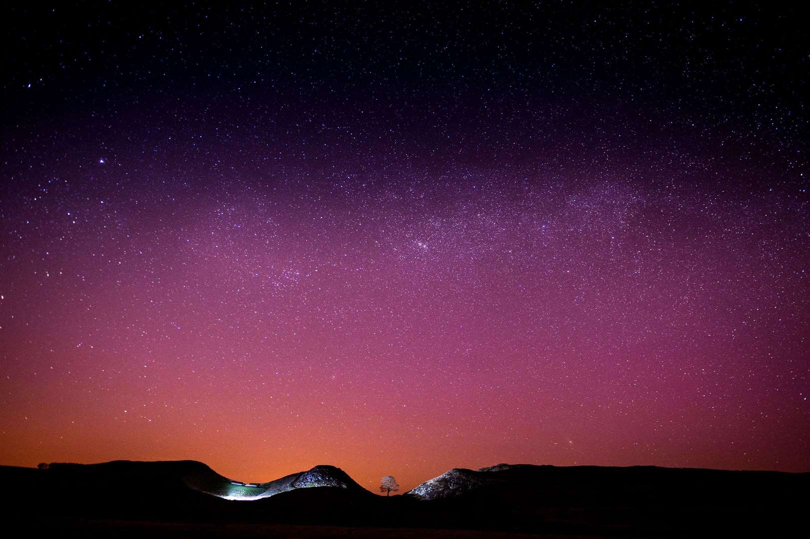 Stars fill the night sky above Sycamore Gap (Owen Humphreys/PA)