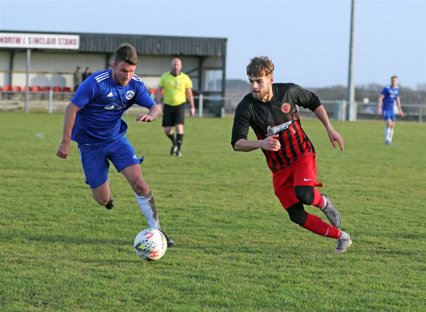 Halkirk United striker Jonah Martens tries to get past Invergordon's Callum Gow during the Anglers' 4-2 victory in a league match at Morrison Park earlier this month. Picture: James Gunn