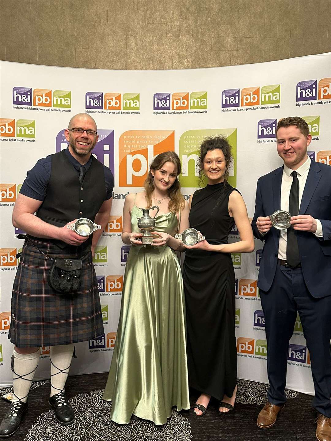 Highland News and Media award winners: (left ro tight) Content editor Andy Dixon, Young Reporter of the Year Iona MacDonald, Photographer of the Year Beth Taylor and Business Writer of the Year Ewan Malcolm