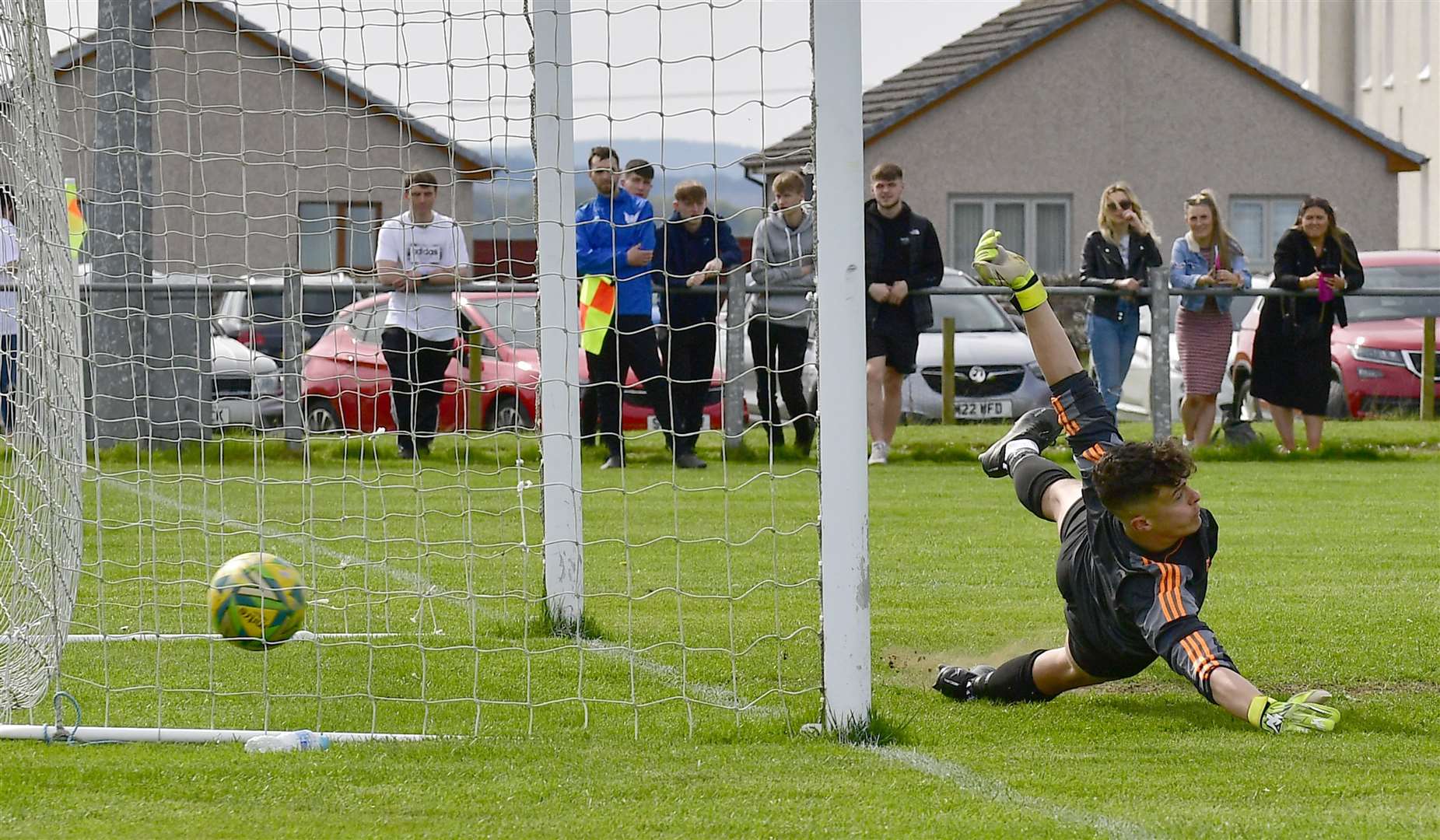 High Ormlie keeper Lewis Gallacher is unable to reach Kyle Innes's spot-kick as Acks take the lead in Saturday's Highland Amateur Cup clash in Halkirk. Picture: Mel Roger