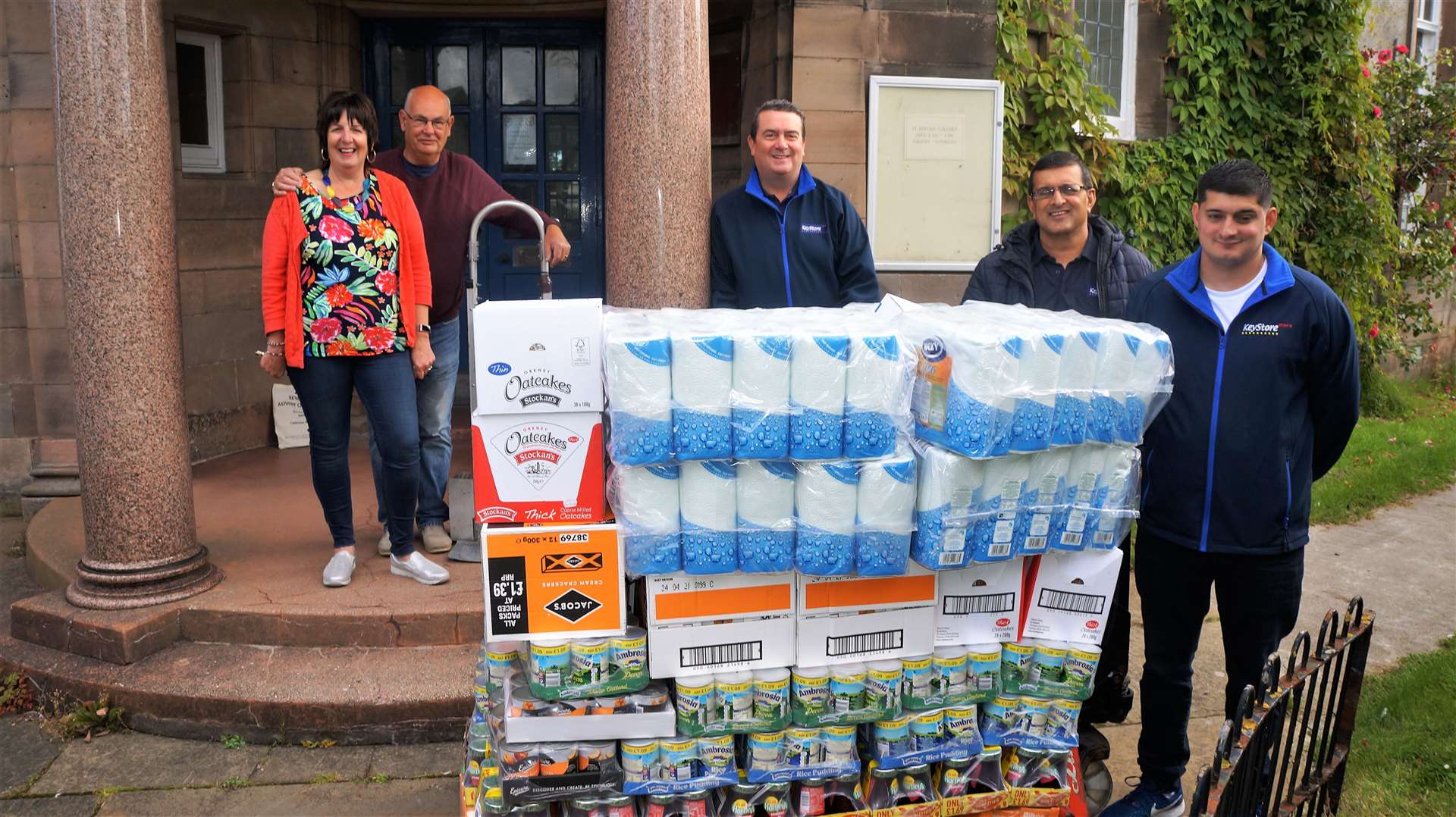 From left, steering group member of Caithness Foodbank in Wick Pat Ramsay, chairman of the food bank Grant Ramsay, regional development manager at KeyStore Graeme Dawson, Younes Amin from Hillhead Foodstore and his son Rehan Amin who runs the KeyStore on Bridge Street.