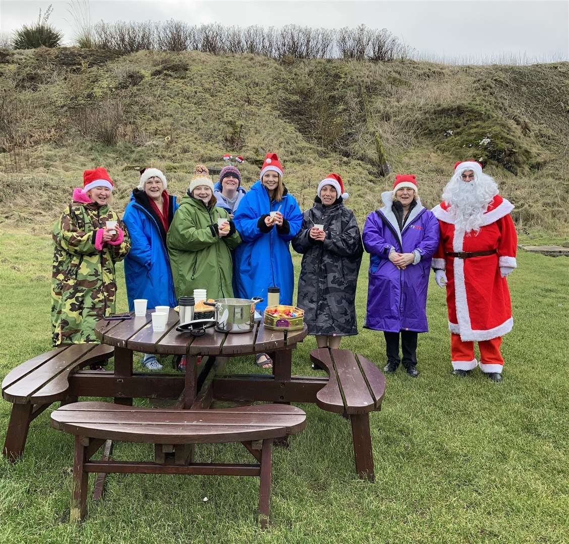 Warming up with some soup after a pre-Christmas dip at Staxigoe harbour – with a visit from Santa.