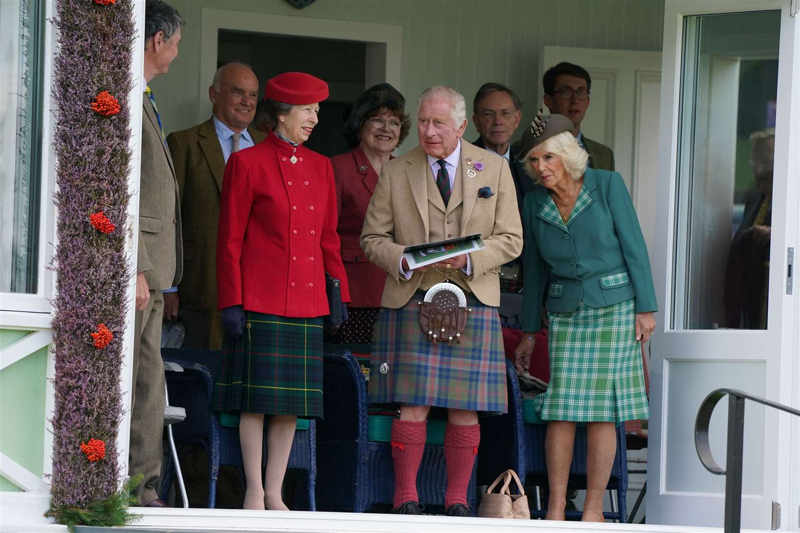They were joined by the King’s sister, the Princess Royal, and her husband Vice Admiral Sir Tim Laurence (obscured, far left) (Andrew Milligan/PA)