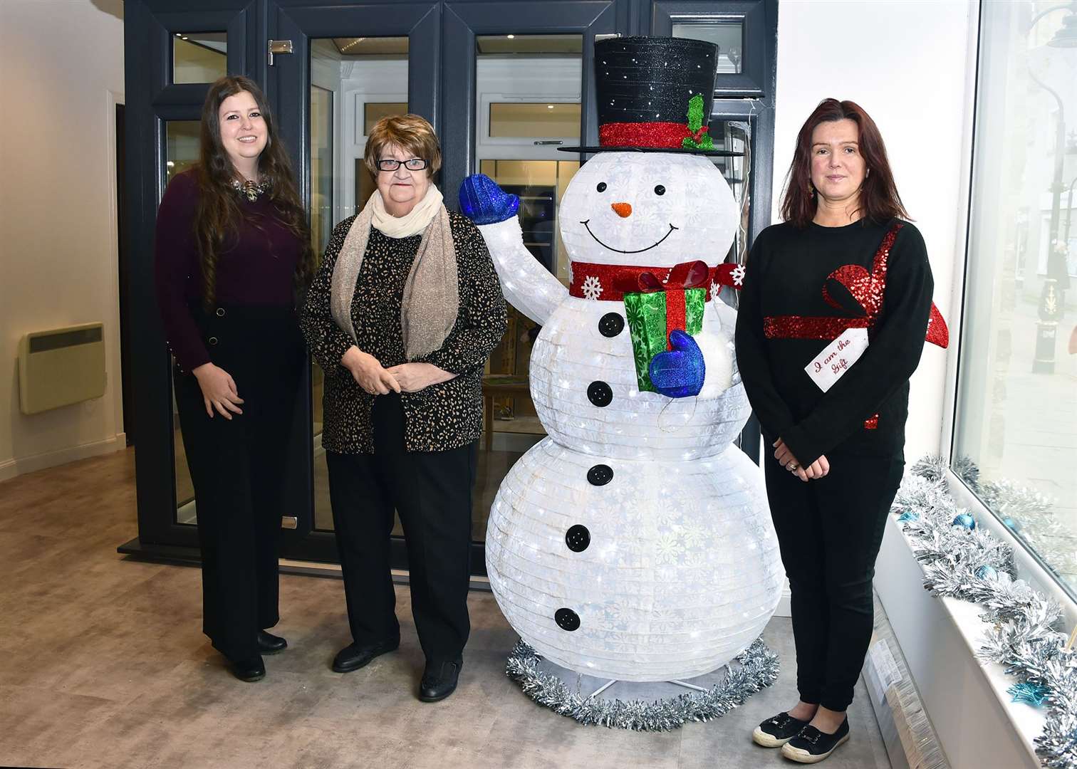 Pip McIntosh (left), manager of Cairngorm's Thurso outlet, with Julie Mackinnon (Wick Youth Club) and Penny Gunn (Castletown Youth Club). Picture: Mel Roger