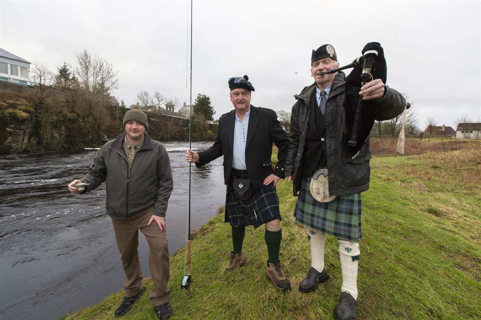 Piper Alasdair Miller with senior ghillie Geordie Doull (left), who toasted the water, and John Graham, of Washington DC, who cast the first fly. Picture: Robert MacDonald / Northern Studios