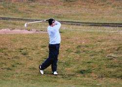 Thurso player Bryan Ronald on his way to winning the North Golf Alliance fixture at Durness.