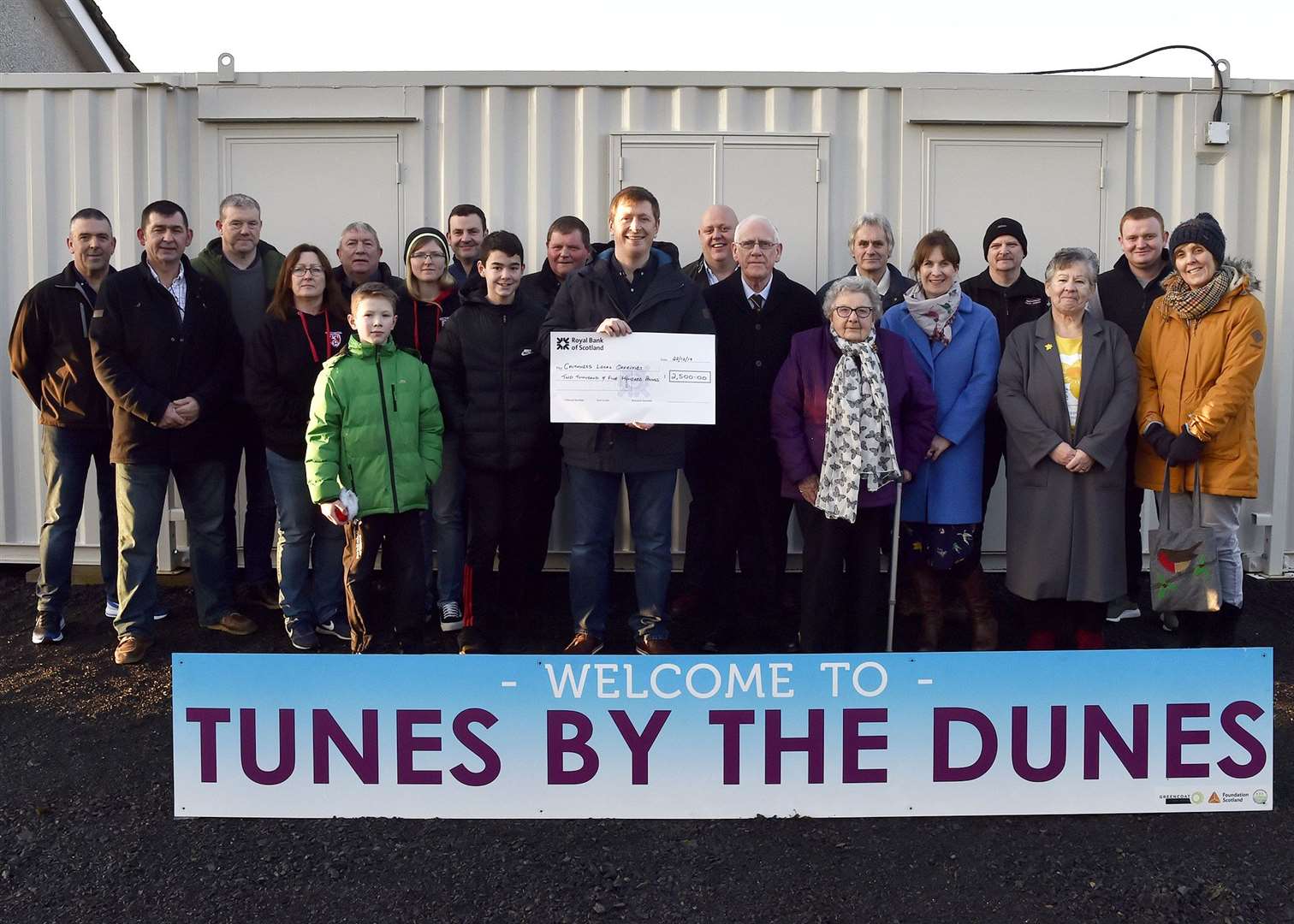 Representatives from the various groups that benefited from Tunes By the Dunes, with festival committee chairman Michael Gray holding a cheque for the overall amount. Picture: Mel Roger