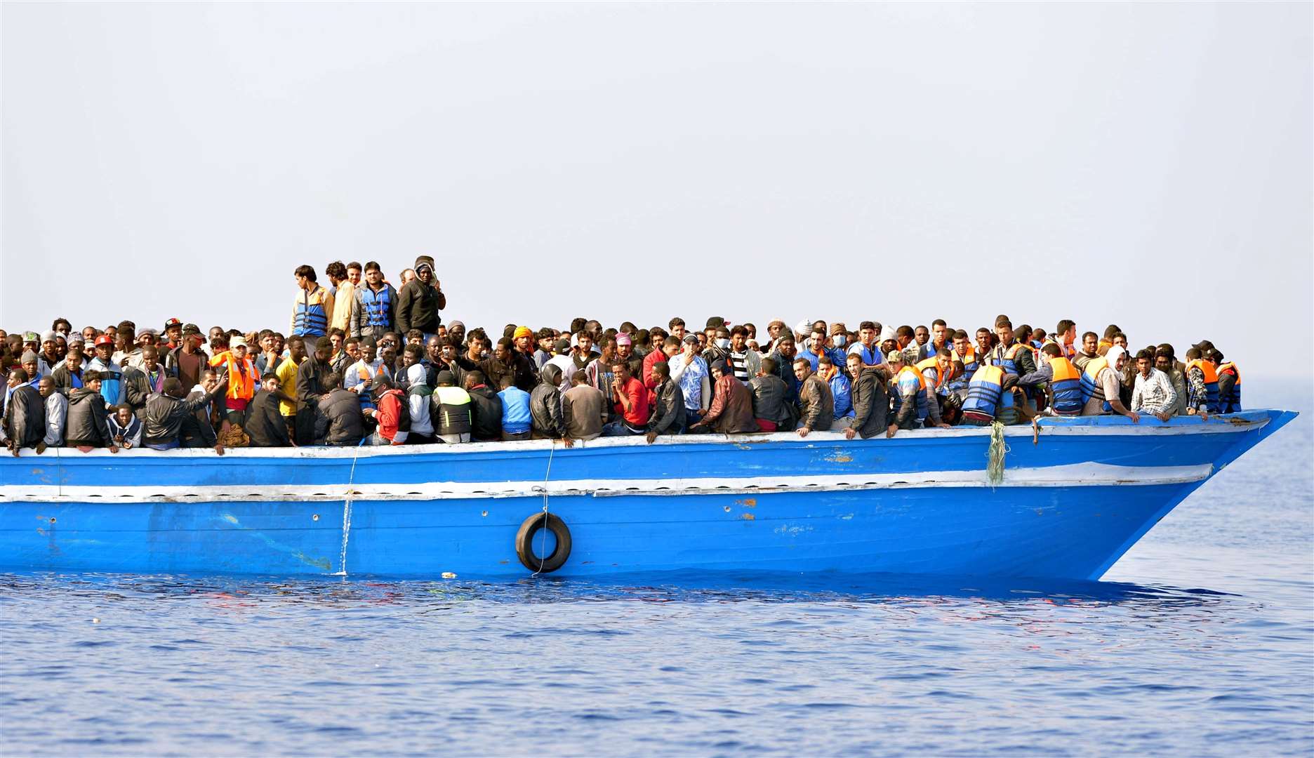 Migrants stranded on a boat, 30 miles off the Libyan coast (Rowan Griffiths/Daily Mirror/PA)