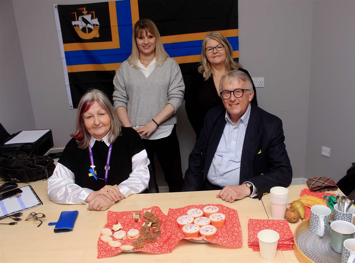 Local MP Jamie Stone in the new constituency office in Wick with Councillor Jan McEwan (seated), constituency support manager Audrey John (standing, left) and case officer Julie Calder. Picture: Alan Hendry