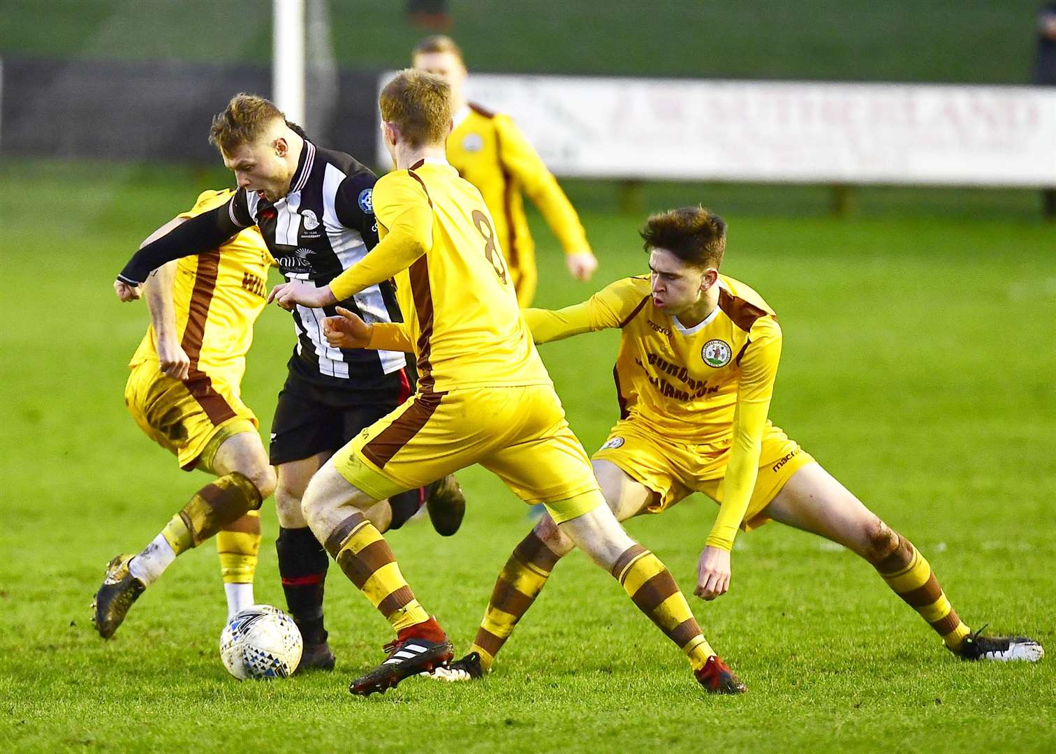 Wick Academy's Jack Halliday powers his way past Forres opponents at Harmsworth Park in January 2020. This was the Scorries' last home game in the Highland League. Picture: Mel Roger