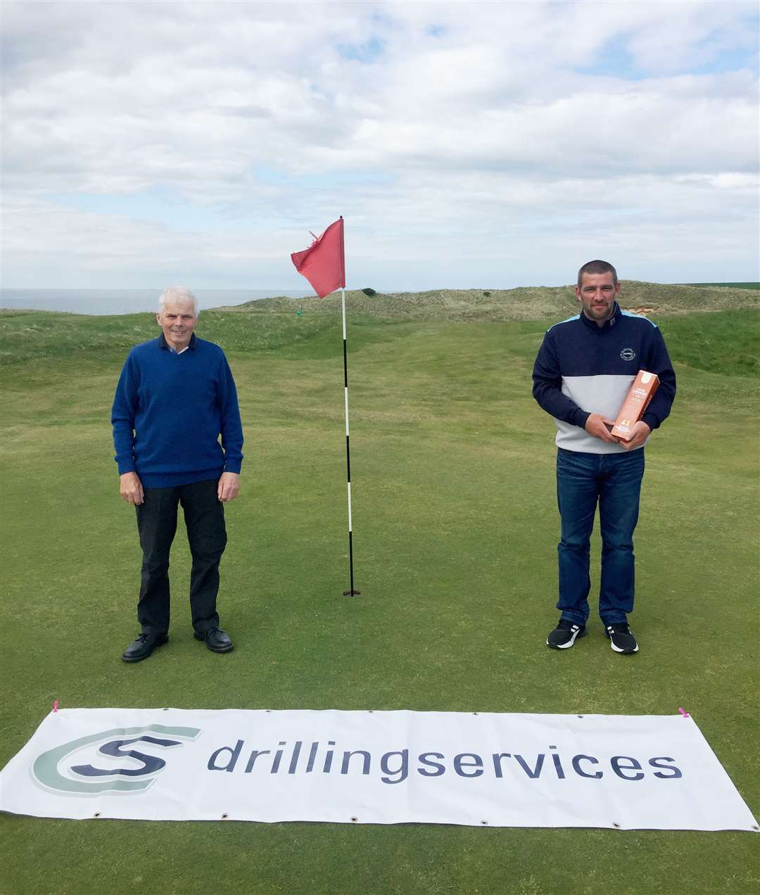 The main prize-winners from the recent NC500 Links Open – nett winner Sandy Chisholm (left) and scratch winner Dougie Thorburn. The event was co-hosted by Wick and Reay golf clubs.