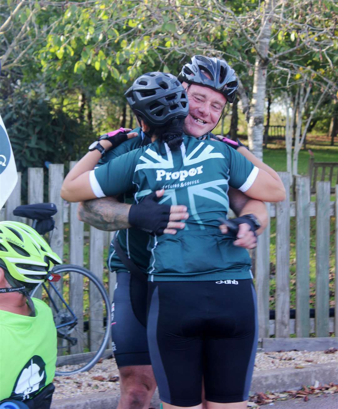 A hug for Kev from fellow cyclist Lucinda Mills at the end of the challenge. Picture: Louise Coopman