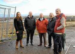 Outside the fenced-off would-be site of Thurso’s new supermarket are (left to right) Tesco representatives Gloria Coates and Duncan Bentrain and Highland councillors Donnie Mackay, John Rosie and Roger Saxon.