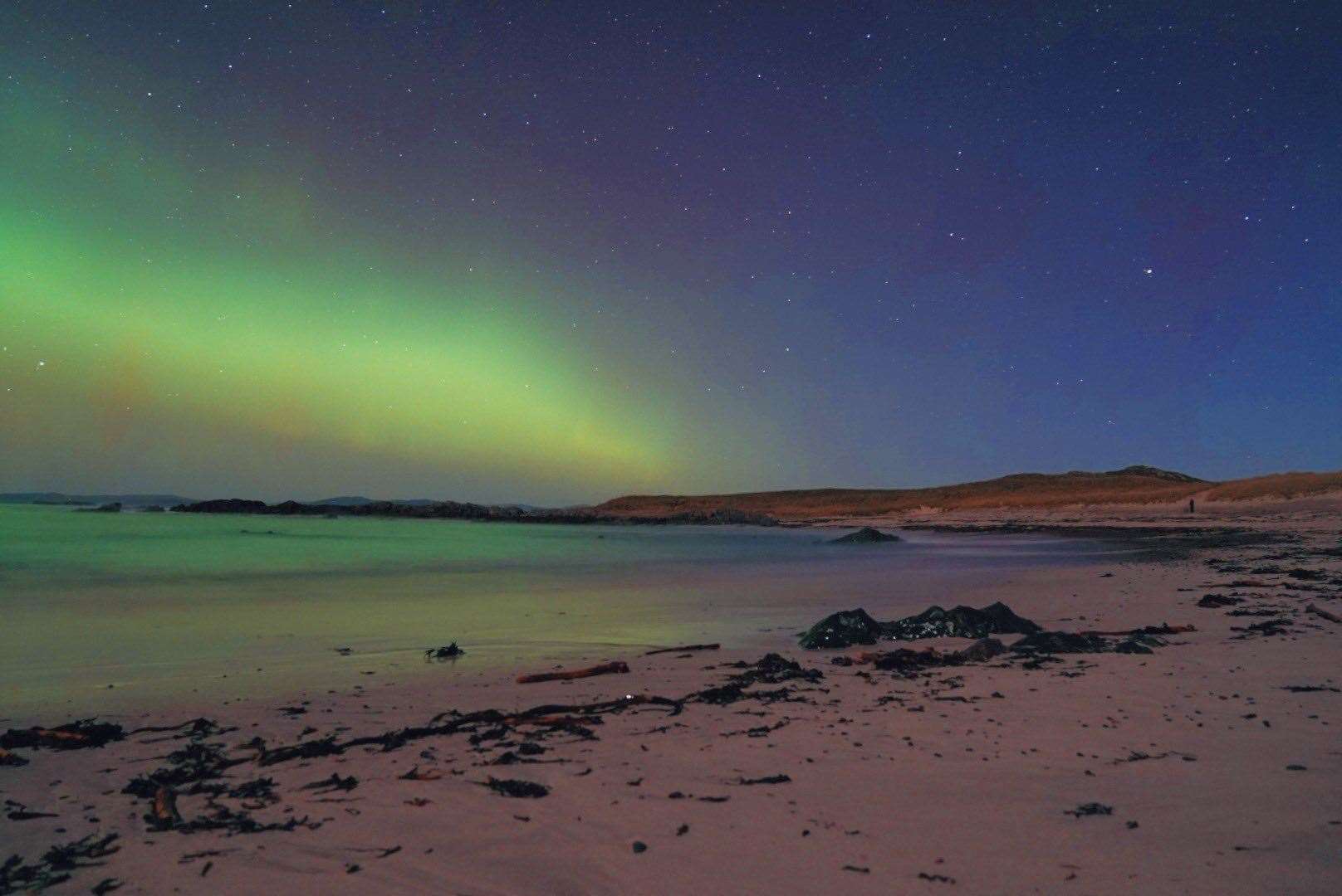 The northern lights over the Hebrides in Scotland (Hannah Close/PA)