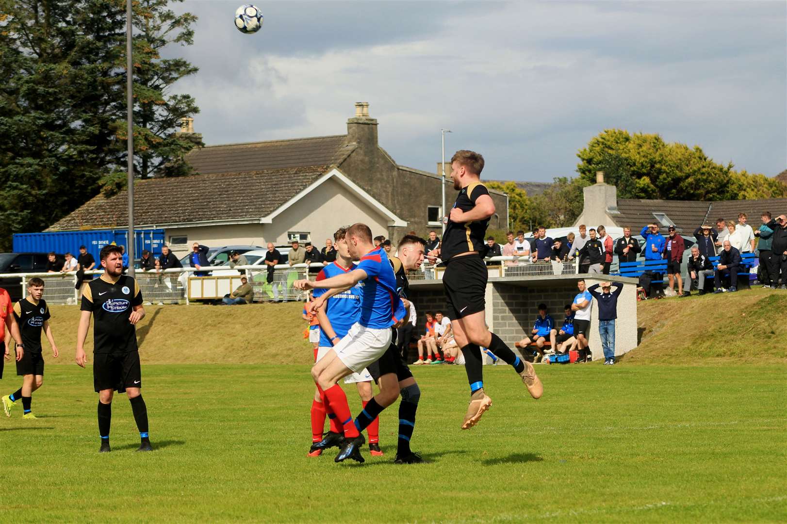 Andy Hardwick heads the ball clear for Acks against Keiss. Picture: Alan Hendry