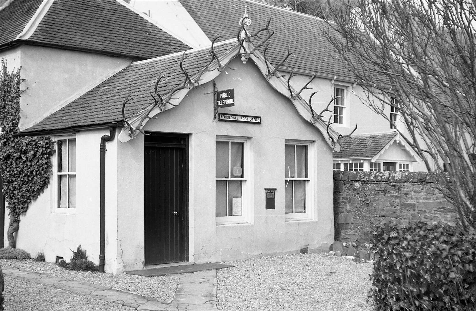 The post office adjoining the estate office at Berriedale, complete with stags' antlers, in the 1960s. Jack Selby Collection / Thurso Heritage Society
