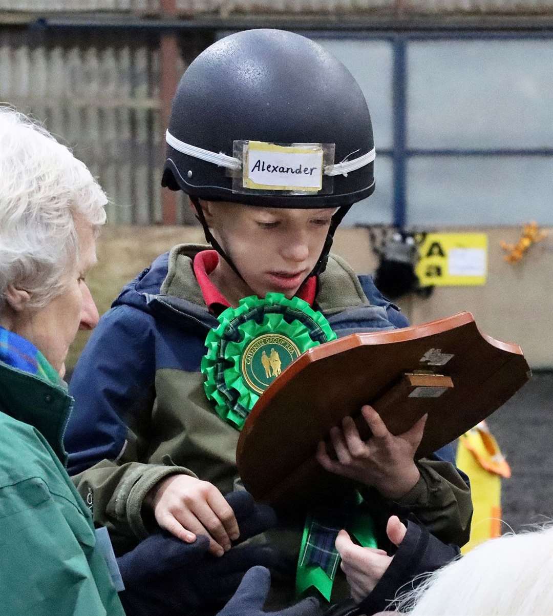 Alexander Jakobik taking a close look at his shield. Picture: Neil Buchan