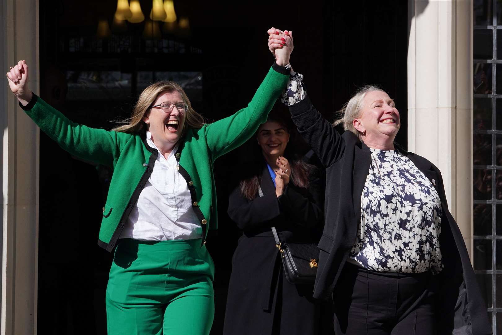 Campaigners from For Women Scotland celebrated outside the Supreme Court in London following the judgment (Lucy North/PA)