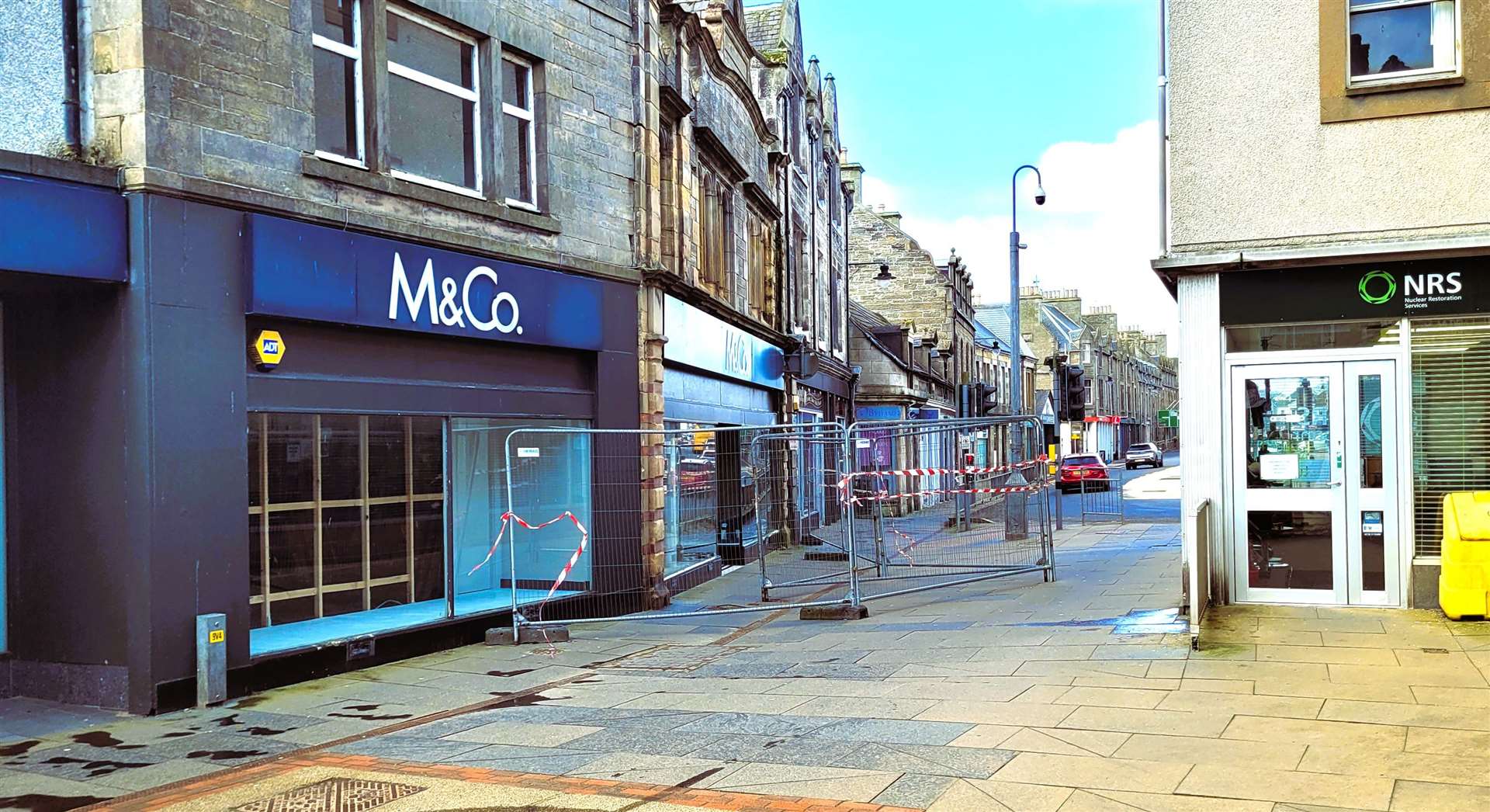 The fencing outside the old M&Co shop in Thurso has been criticised for causing a major obstruction. Picture: Alexander Glasgow